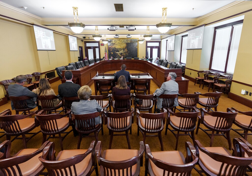(Leah Hogsten | The Salt Lake Tribune) Jon Cox, seated, one of nine nominees to the Utah Board of Higher Education, addresses members of the Utah Senate Education Confirmation Committee, Monday, June 5, 2023 at the Capitol. 