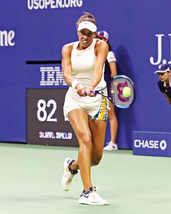 Madison Keys returns a shot to Carla Suarez Navarro, of Spain, during the quarterfinals of the U.S. Open tennis tournament at the USTA Billie Jean King National Tennis Center on Wednesday, Sept. 5, 2018, in New York. (Photo by Greg Allen/Invision/AP)