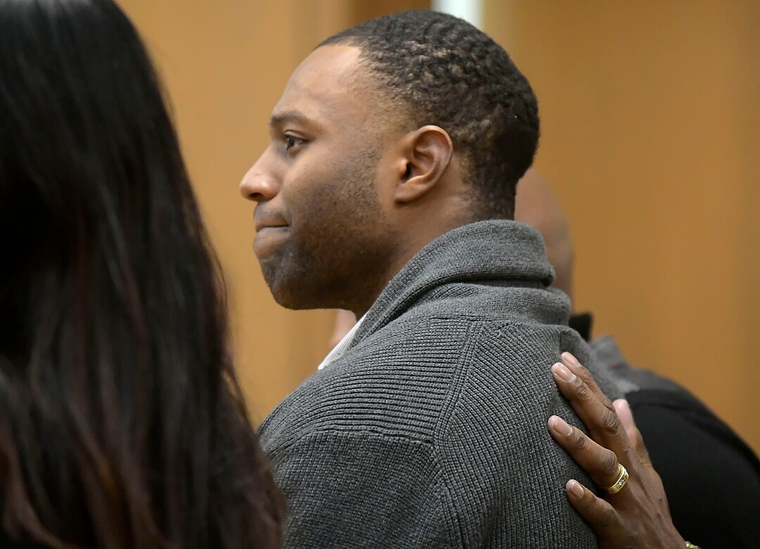 Torrey Green reacts as a jury finds him guilty of eight charges including five counts of rape and a charge sexual battery in connection to reports from six women accusing him of sexual assault while he was a football player at Utah State University, Friday, Jan.18, 2019 in Brigham City, Utah. (Eli Lucero/Herald Journal via AP)