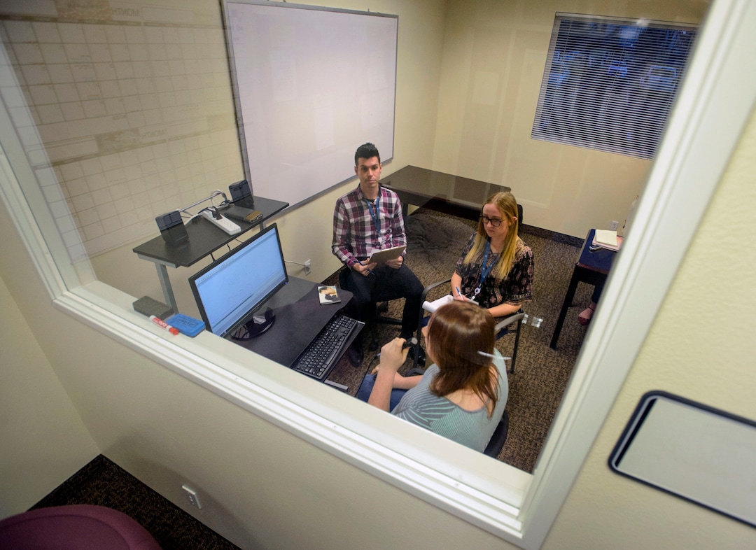 (Steve Griffin  |  The Salt Lake Tribune) Jordan Gabbitas, bottom, works with students Timothy Baker and Abbey Lasek as she uses computer software at Rocky  Mountain University to help the consistency of her voice. The speech clinic helps transgender individuals match their voice to their gender. She was at the Provo, Utah clinic Tuesday January 16, 2018.