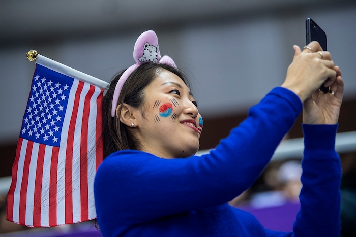(Chris Detrick  |  The Salt Lake Tribune)  A woman takes a selfie during the Men's 500m Short Track Speed Skating at Gangneung Ice Arena Pyeongchang 2018 Winter Olympics Tuesday, Feb. 20, 2018. 