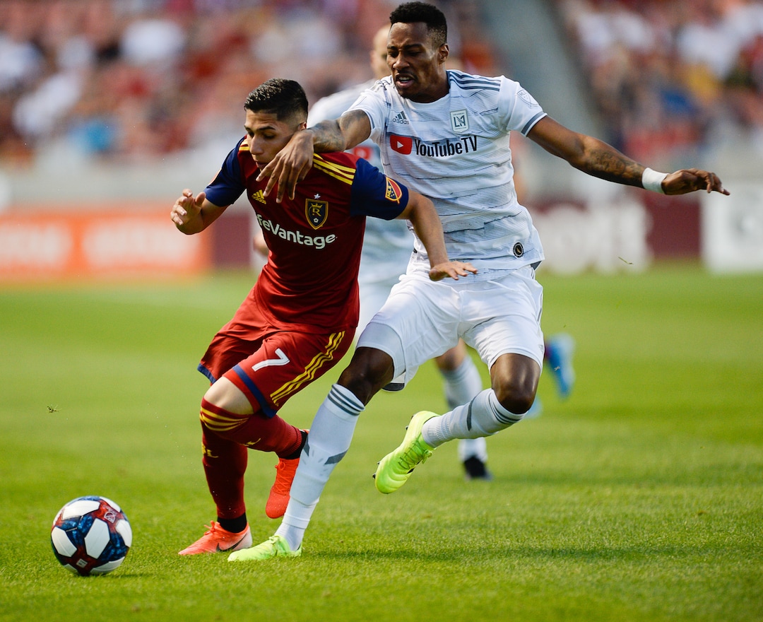 (Francisco Kjolseth  |  The Salt Lake Tribune)  Real Salt Lake forward Jefferson Savarino (7) battles Los Angeles FC midfielder Mark-Anthony Kaye (14) as Real Salt Lake hosts Los Angeles FC at Rio Tinto Stadium in Sandy on Saturday, Aug. 17, 2019.
