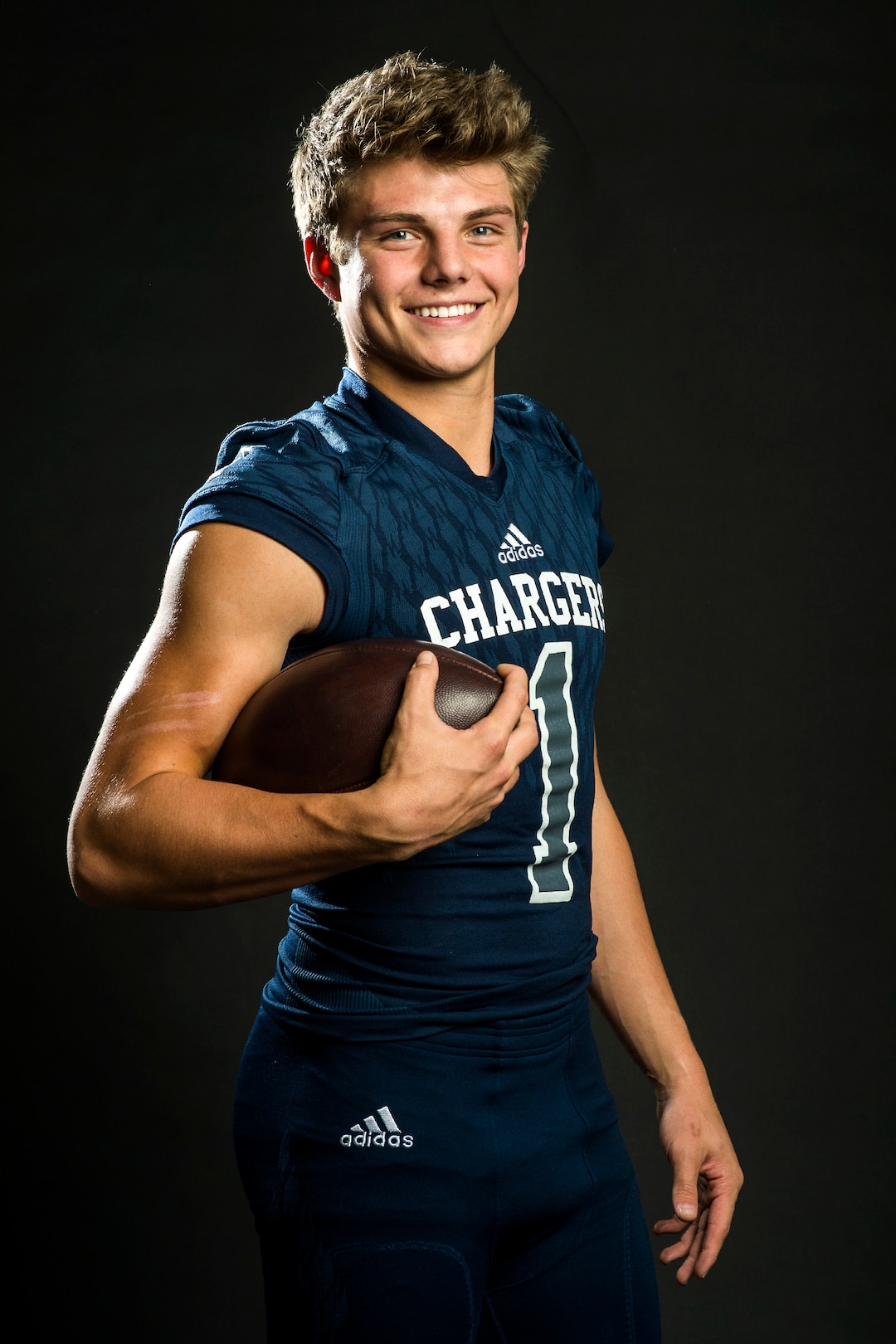 (Chris Detrick  |  The Salt Lake Tribune)  Corner Canyon quarterback Zach Wilson poses for a portrait Wednesday, December 13, 2017.  