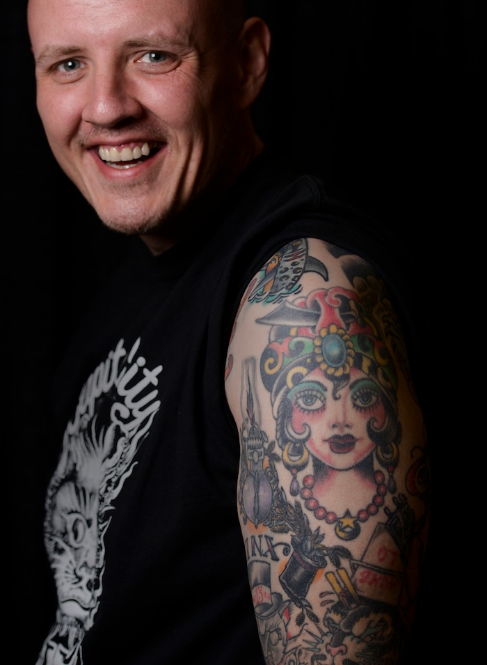 (Leah Hogsten | The Salt Lake Tribune) Tattoo artist Josh Brown with Capitol City Tattoo in Olympia, WA shows of his gypsy girl at the Salt Lake City International Tattoo Convention, Saturday, March 17, 2018.