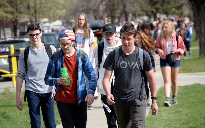 (Al Hartmann  |  The Salt Lake Tribune) 	
Over one hundred students at Highland High School staged a walkout Friday April 20, 2018 in honor of the anniversary of the Columbine High School massacre. Demonstrators walked from the school to Sugar House Park where they made posters, wrote letters to their congressmen and listened to speakers. 