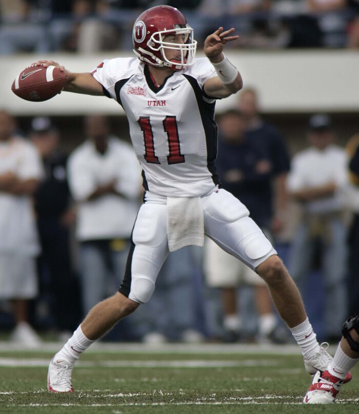 (Trent Nelson | Tribune file photo) Utah quarterback Alex Smith against the Utah State Aggies in Logan, Sept. 18, 2004.