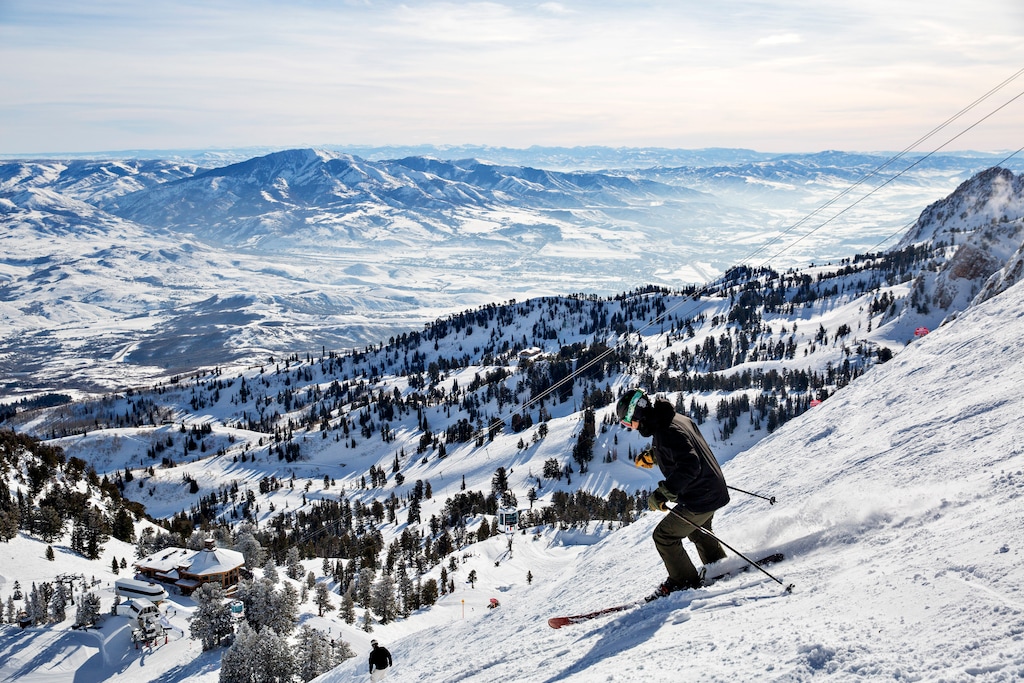 (Kim Raff | The New York Times) A skier descends Grizzly, the course where the men's 2002 Olympic downhill competition was run, at the Snowbasin resort in Utah, Feb. 1, 2020.