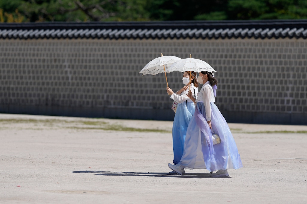 (Lee Jin-man | AP) Visitors walk at the Gyeongbok Palace, one of South Korea's well-known landmarks, in Seoul, South Korea, Wednesday, Sept. 7, 2022.