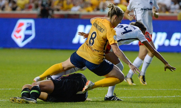 (Francisco Kjolseth  |  The Salt Lake Tribune)  Utah Royals FC hosts Washington Spirit, NWSL soccer at Rio Tinto Stadium in Sandy, Wed. Aug. 8, 2018. Utah Royals FC forward Amy Rodriguez (8) and Washington Spirit defender Estelle Johnson (24) avoid colliding with Washington Spirit goalkeeper Aubrey Bledsoe (1). 