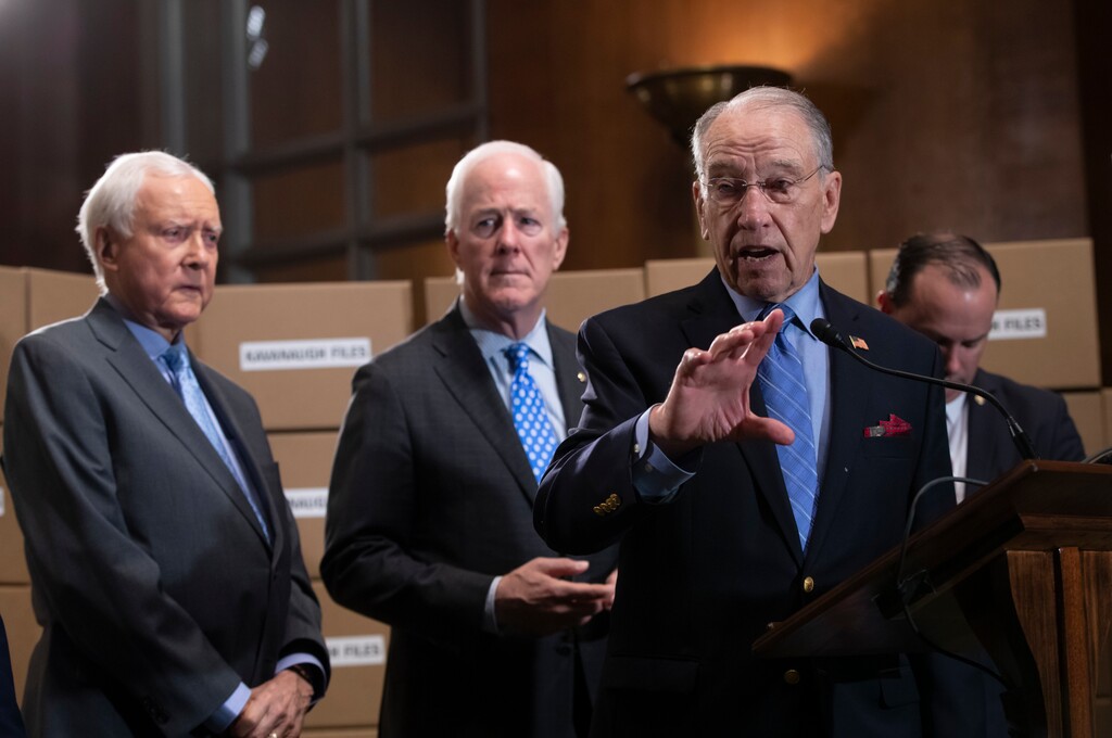 Senate Judiciary Chairman Chuck Grassley, R-Iowa, joined from left by Sen. Orrin Hatch, R-Utah, Sen. John Cornyn, R-Texas, and Sen. Mike Lee, R-Utah, holds a news conference to refute Senate Democrats who are intensifying their fight over documents related to Supreme Court nominee Brett Kavanaugh's stint as staff secretary at the White House, on Capitol Hill in Washington, Thursday, Aug. 2, 2018. (AP Photo/J. Scott Applewhite)