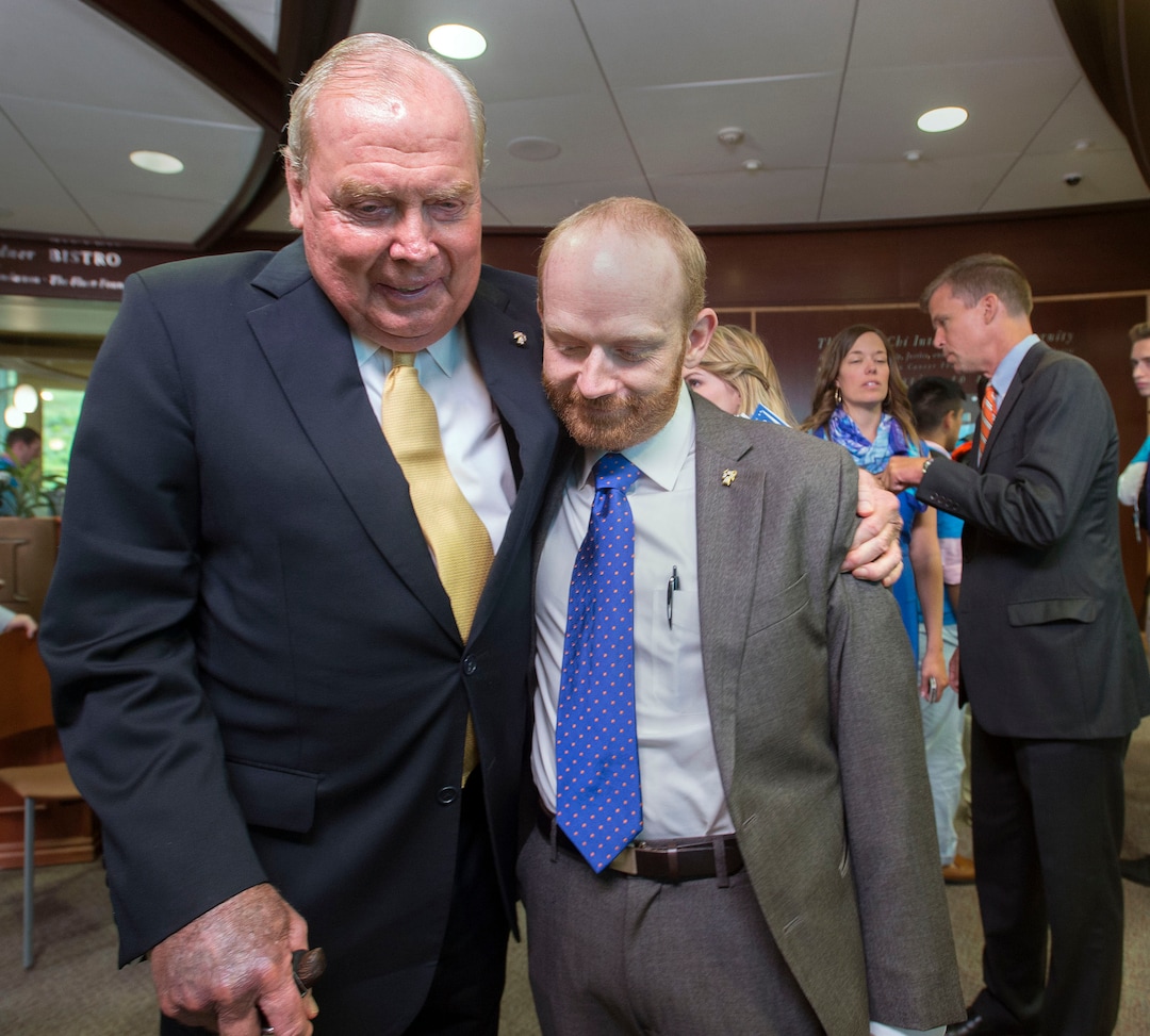 (Steve Griffin  |  The Salt Lake Tribune) Jon Huntsman, left, hugs cancer survivor and fellow Sigma Chi brother Brandon Plewe, following press conference announcing the fraternity's commitment to raise $10 million for cancer research at Huntsman Cancer Institute (HCI), pledging to be ÒThe Generation to End Cancer.Ó This is believed the largest gift committed to one charity in menÕs fraternity history. To acknowledge the commitment, the sixth floor of Huntsman Cancer Hospital will be named ÒThe Sigma Chi International Fraternity Sixth Floor.Ó  The gift is a gesture of Sigma ChiÕs vision of friendship, justice, and learning to ease the suffering of cancer patients and their families at the Huntsman Cancer Hospital in Salt Lake City, Monday, June 15, 2015. 
