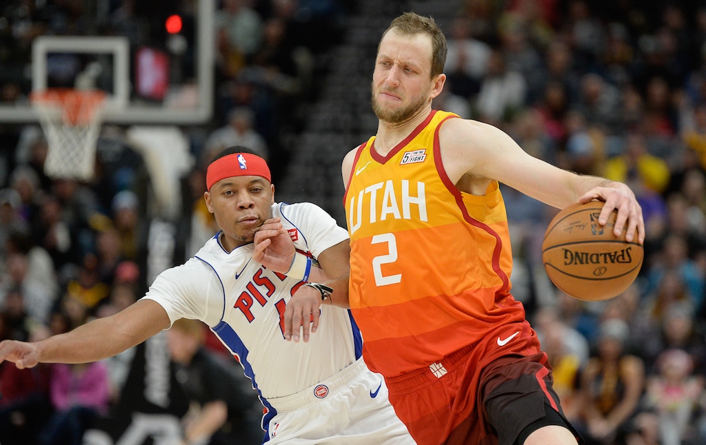 (Francisco Kjolseth | The Salt Lake Tribune) Detroit Pistons guard Tim Frazier (12) gets pushed by Utah Jazz forward Joe Ingles (2) as the Utah Jazz host the Detroit Pistons in their NBA basketball game at Vivint Smart Home Arena in Salt Lake City on Monday, Dec. 30, 2019.