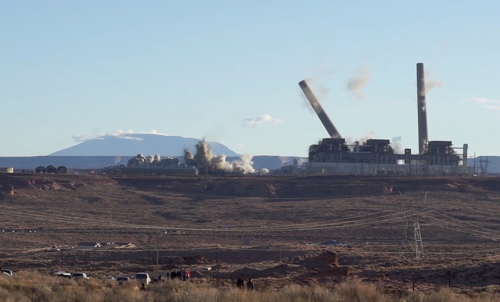 (Zak Podmore | The Salt Lake Tribune) The smokestacks on the Navajo Generating Station coming down on December 18, 2020.