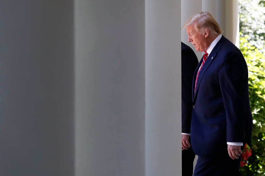 (Jacquelyn Martin | AP) President Donald Trump walks through the Colonnade of the White House, next to Polish President Andrzej Duda, as they arrive for a news conference in the Rose Garden, Wednesday June 12, 2019, in Washington.