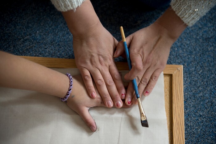 (Jeremy Harmon  |  The Salt Lake Tribune) Vicky Chavez worlds on a craft project with her 7-year-old daughter Yaretzi in their room at the First Unitarian Church on 1300 East in Salt Lake City on Dec. 14, 2018.