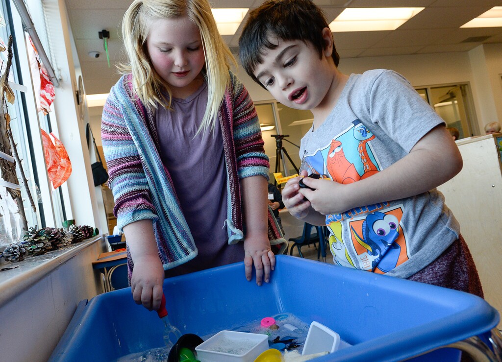 (Francisco Kjolseth | The Salt Lake Tribune) Emma Mitchell, 10, who donated her $5 weekly allowance to help the homeless, plays with some of the kids who attend the Head Start of South Salt Lake, including Hayden, 5, and some of the other kids who were or are currently homeless. Shelter the Homeless, a nonprofit organization leading efforts surrounding the new resource centers, provided an update on fundraising efforts surrounding the Larry H. and Gail Miller familyÕs $10 million matching grant, including notable donations from individuals and organizational donors both large and small.
