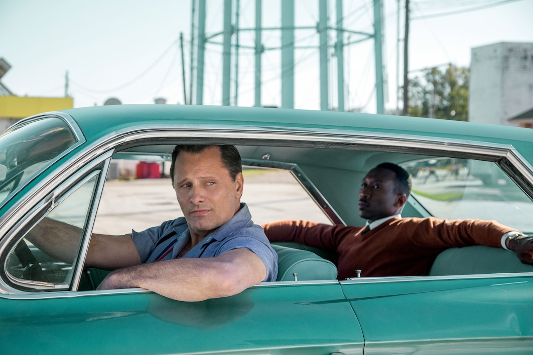 This image released by Universal Pictures shows Viggo Mortensen, left, and Mahershala Ali in a scene from "Green Book." The National Board of Review announced their 2018 honorees, Tuesday, Nov. 27, 2018, with top awards going to "Green Book" as best film of the year and best actor of the year going to Mortensen. (Patti Perret/Universal Pictures via AP)