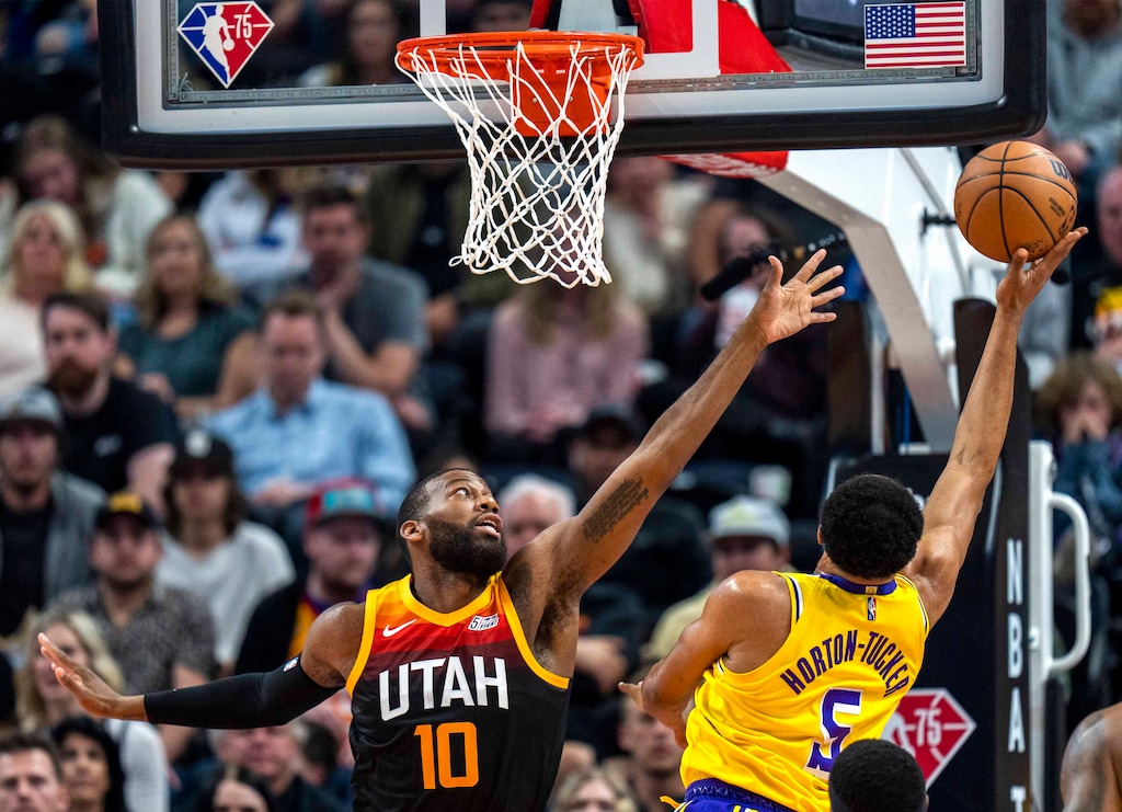 (Rick Egan | The Salt Lake Tribune) Los Angeles Lakers guard Talen Horton-Tucker (5) shoots as Utah Jazz center Greg Monroe (10) defends, in NBA action between the Utah Jazz and the Los Angeles Lakers, at Vivint Arena, on Thursday, March 31, 2022.