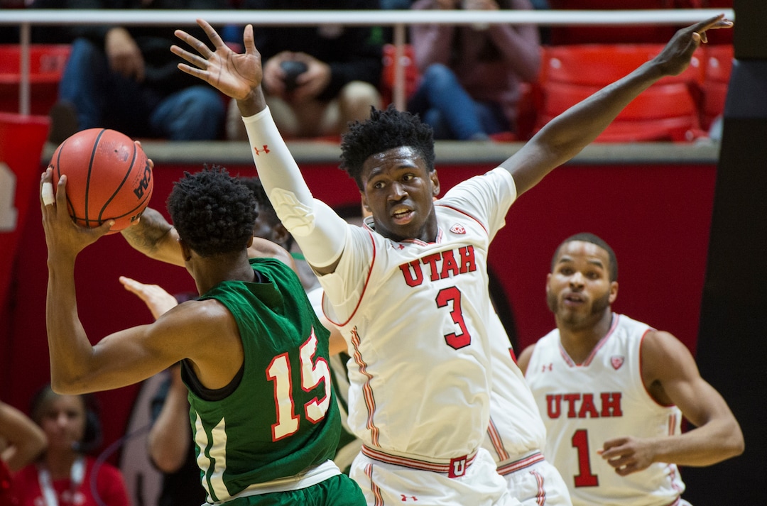 (Rick Egan  |  The Salt Lake Tribune)    Utah Utes forward Donnie Tillman (3) puts pressure on Mississippi Valley State Delta Devils guard Michael Green (15), in basketball action between Utah Utes and Mississippi Valley State Delta Devils at the Jon M. Huntsman Center, Thursday, Nov. 15, 2018.