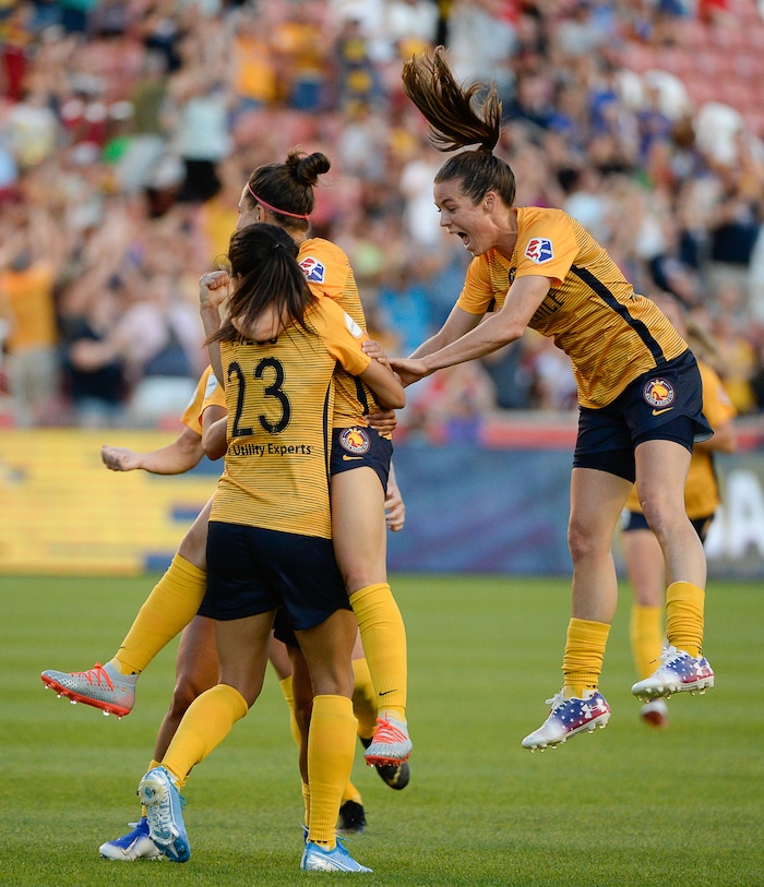 (Francisco Kjolseth  |  The Salt Lake Tribune)  Utah Royals FC forward Christen Press (23) is celebrated after scoring the first goal of the night as Utah Royals FC hosts the North Carolina Courage at Rio Tinto Stadium in Sandy, Utah on Saturday, July 27, 2019.