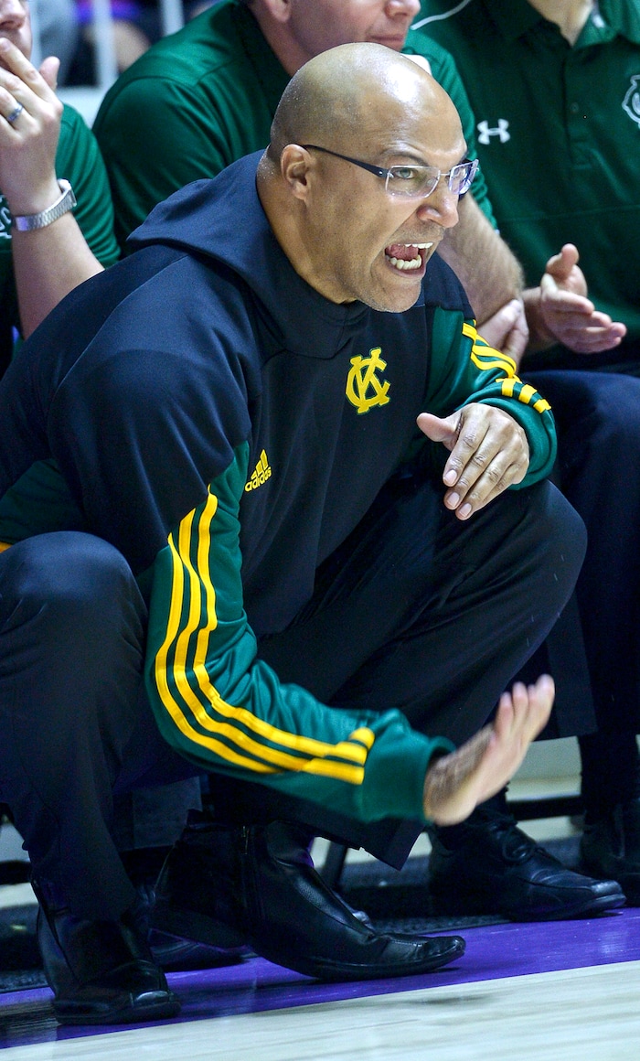 (Leah Hogsten  |  The Salt Lake Tribune) Kearns' head coach Dan Cosby tries to get the team's attention. Weber defeated Kearns 60-52 in the 6A High School Boys' Basketball Tournament opening game at Weber State University’s Dee Events Center in Ogden, Tuesday, Feb. 27, 2018. 