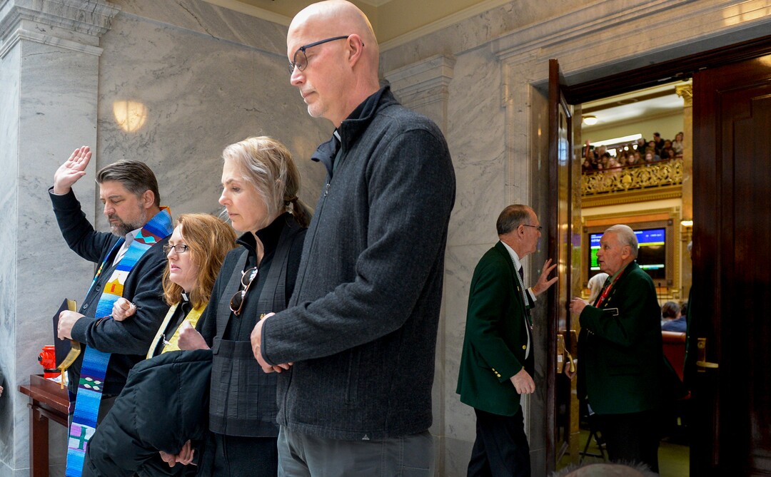 Leah Hogsten  |  The Salt Lake Tribune  Faith leaders l-r Rev. Curtis Price with The First Baptist Church of Salt Lake City, Rev. Monica Dobbins with the First Unitarian Church of Salt Lake City, Zen Buddhist Anna Zumwalt and Pastor David Nichols with Mt. Tabor Lutheran Church demonstrate in opposition to SB96 outside the Utah House chambers, Feb. 8, 2019. 