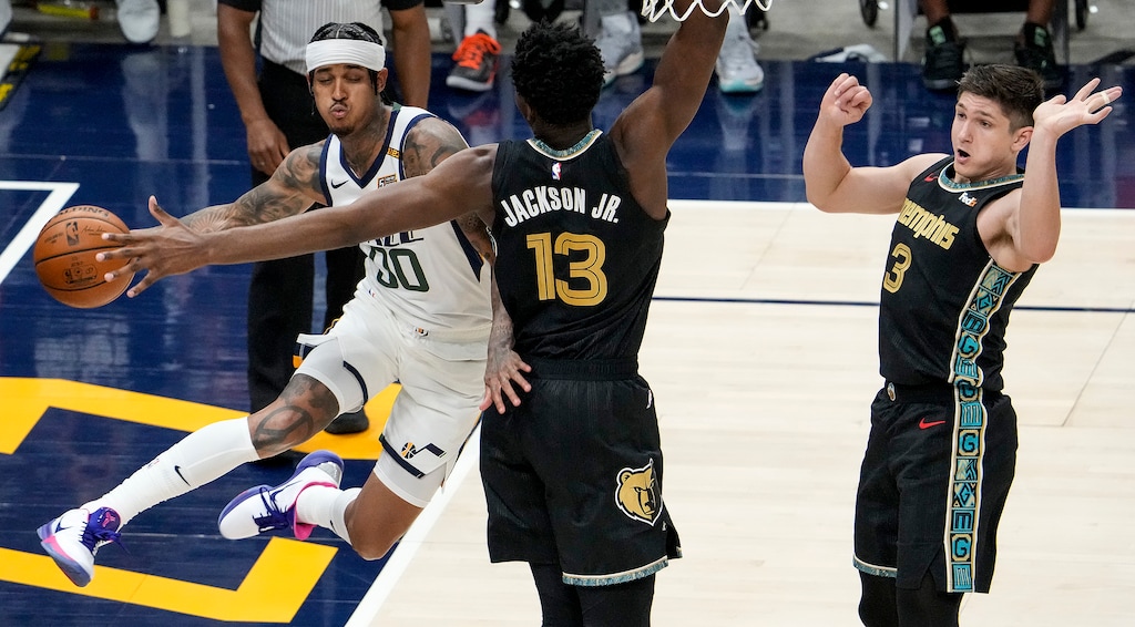 (Leah Hogsten | The Salt Lake Tribune) Utah Jazz guard Jordan Clarkson (00) is pressured by Memphis Grizzlies forward Jaren Jackson Jr. (13) as the Utah Jazz take on the Memphis Grizzlies during Game 1 of the first-round playoffs at Vivint Arena, May 23, 2021.