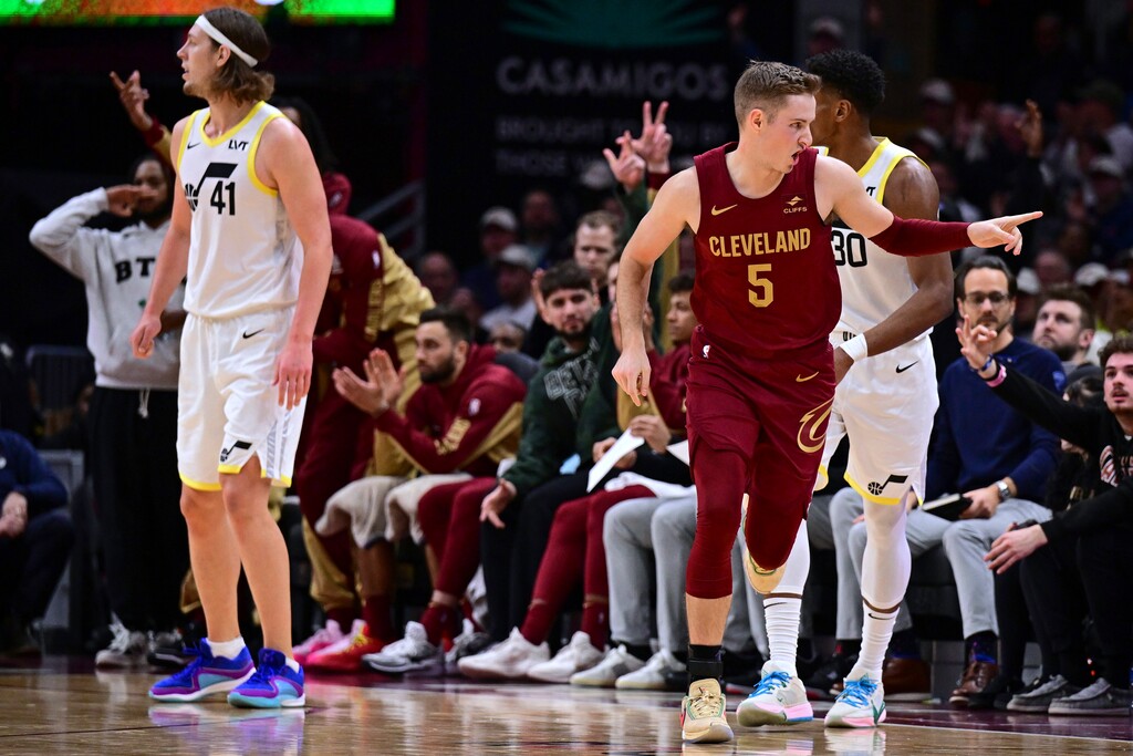 (David Dermer | AP) Cleveland Cavaliers guard Sam Merrill reacts after a 3-point basket against the Utah Jazz during the second half of an NBA basketball game Wednesday, Dec. 20, 2023, in Cleveland.