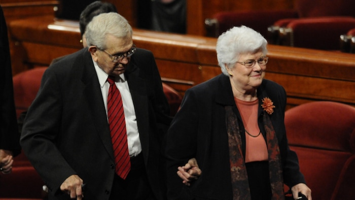 (The Church of Jesus Christ of Latter-day Saints) President Boyd K. Packer leaves the October 2010 General Conference with his wife, Donna.
