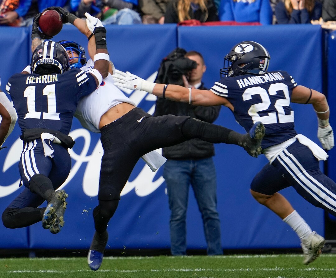 (Leah Hogsten | The Salt Lake Tribune) Boise State Broncos wide receiver Khalil Shakir (2) pulls down the pass past Brigham Young Cougars defensive back Isaiah Herron (11) as No. 10 Brigham Young University hosts Boise State at LaVell Edwards Stadium, Oct. 9, 2021.