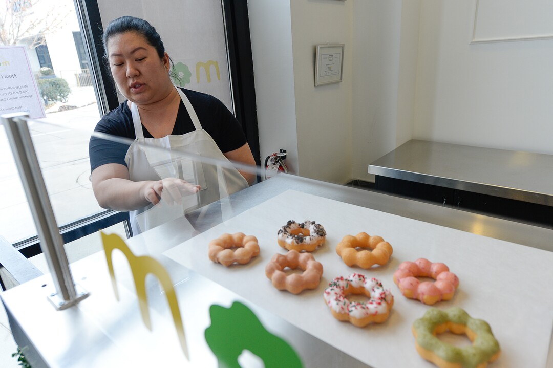 (Francisco Kjolseth  |  The Salt Lake Tribune)  Tracy Chao, co-owner of the recently opened Momi Donuts, an Asian-inspired treat, made with rice flour and tapioca starch, talks about their treat as they join the lineup of food options at the south end of The Gateway.