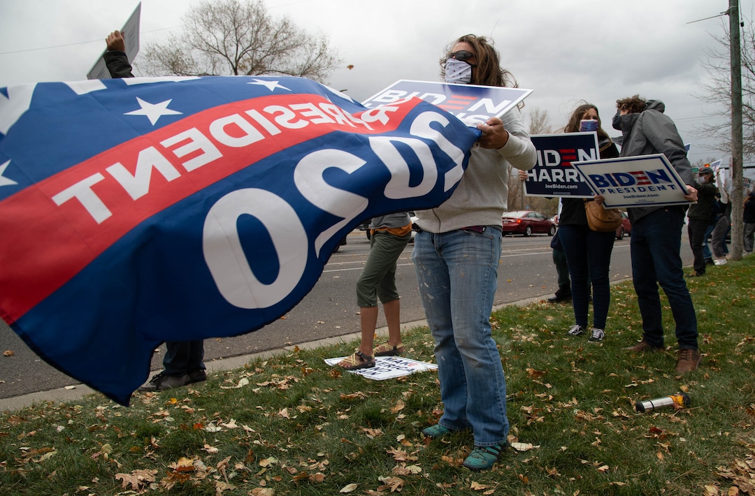 (Francisco Kjolseth  |  The Salt Lake Tribune) Julie Lefgren joins other supporters of President-elect Joe Biden as they celebrate at Liberty Park on Saturday, Nov. 7, 2020, in Salt Lake City.