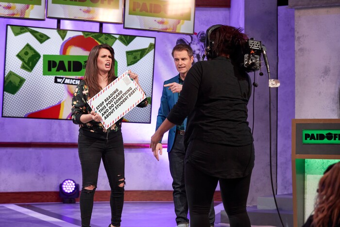 (Photo courtesy of truTV) Host Michael Torpey, right, in one of the bizarre moments on "Paid Off."