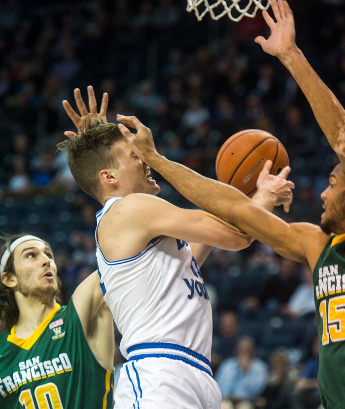 (Rick Egan  |  The Salt Lake Tribune)    San Francisco Dons guard Jordan Ratinho (25) stops Brigham Young Cougars guard McKay Cannon (24) from scoring,  in basketball action at the Marriott Center, Saturday, February 10, 2018.