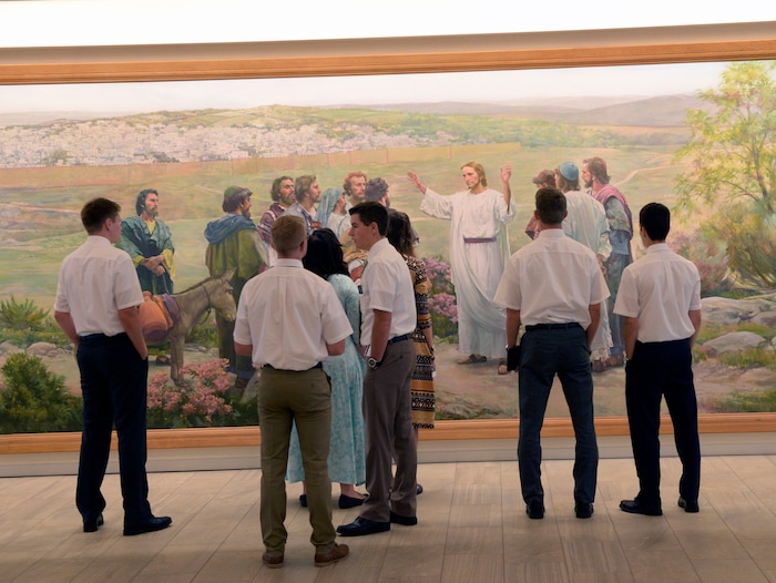 Al Hartmann  |  The Salt Lake TribuneMissionaries take in the artwork in the new building at the Missionary Training Center in Provo Wednesday July 26.  It opened in June. 