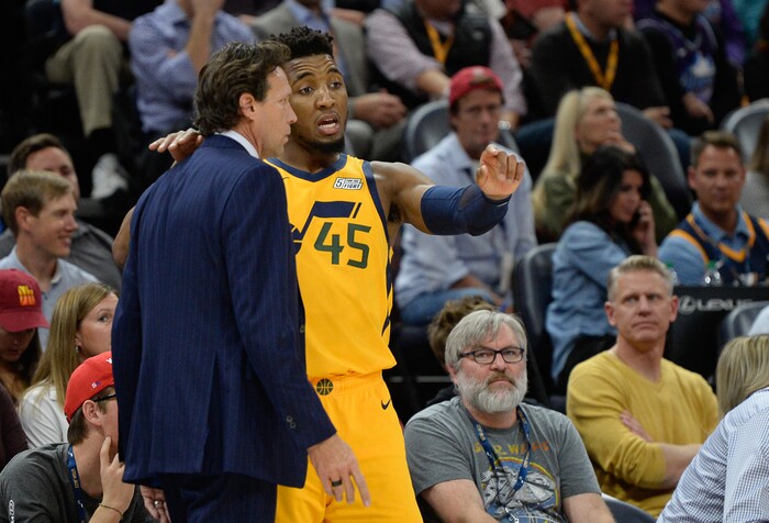 (Francisco Kjolseth  |  The Salt Lake Tribune)  Coach Quin Snyder talks with Utah Jazz guard Donovan Mitchell (45) as the Utah Jazz host the Philadelphia 76ers in their NBA basketball game at Vivint Smart Home Arena in Salt Lake City on Wednesday, Nov. 6, 2019.