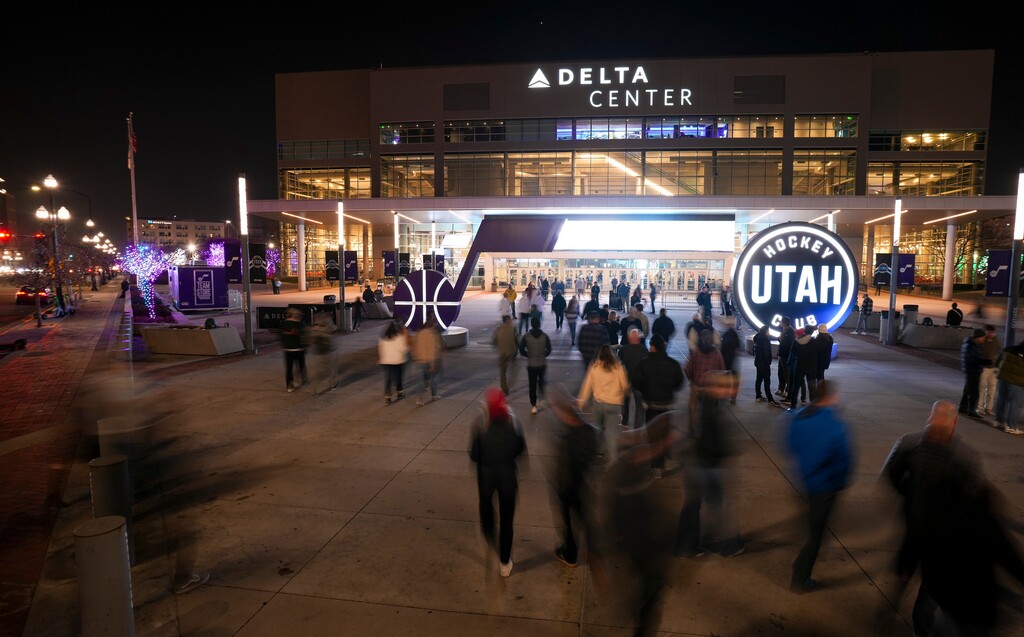 (Bethany Baker | The Salt Lake Tribune) People walk up to the Delta Center in Salt Lake City on Monday, Dec. 23, 2024.