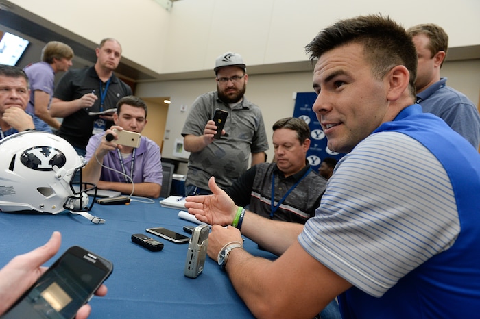 (Francisco Kjolseth  |  The Salt Lake Tribune)  Quarterback Tanner Mangum is interviews by the media as BYU hosts their eighth-annual football media day at the BYU-Broadcasting Building on Friday, June 22, 2018.