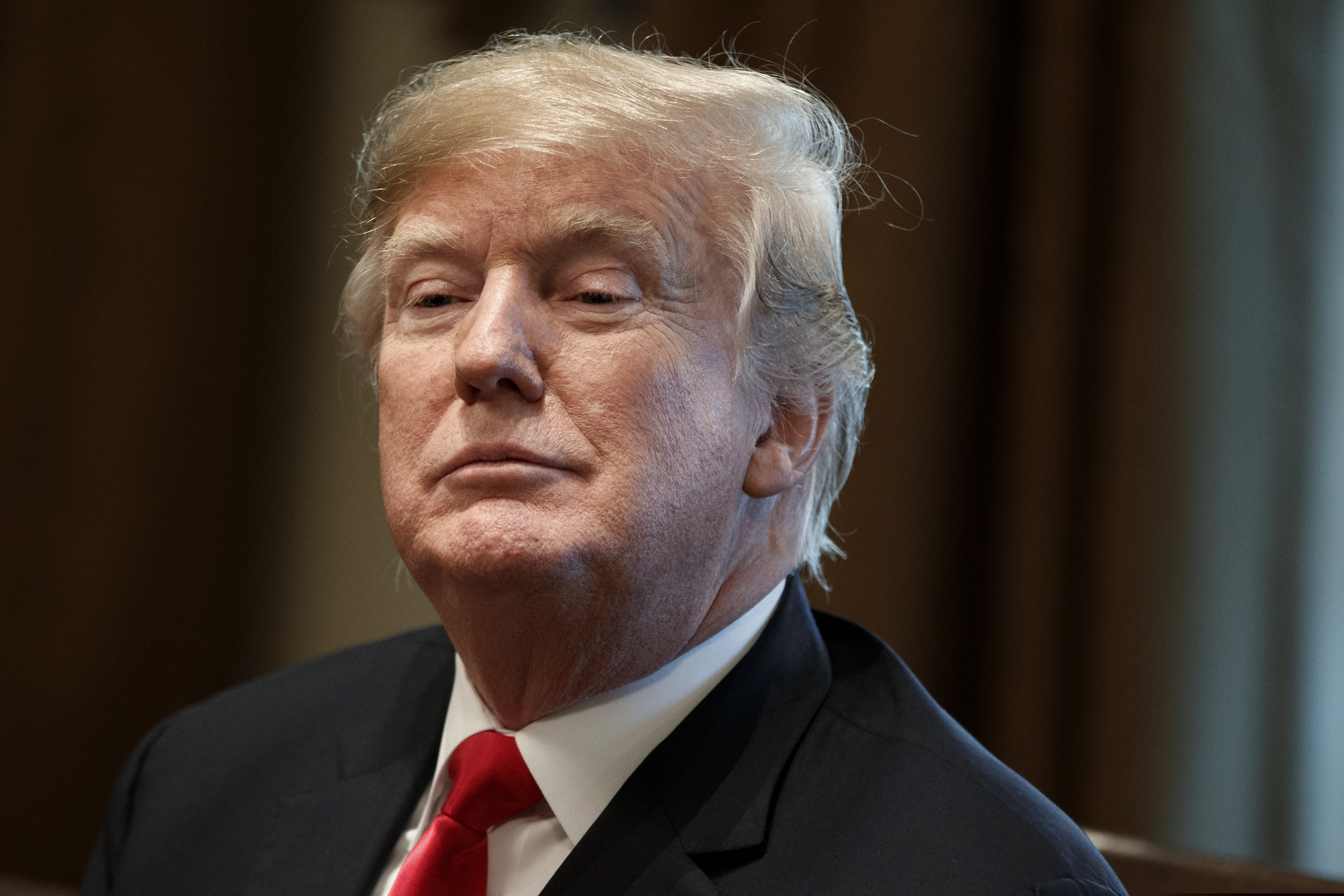 FILE - In this Dec. 13, 2018, file photo, President Donald Trump listens during a meeting in the Cabinet Room of the White House in Washington. New York Attorney General Barbara Underwood and Trump’s charitable foundation reached a deal on Tuesday, Dec. 18, 2018, to dissolve the foundation and distribute its remaining assets to other nonprofit groups. (AP Photo/Evan Vucci, File)