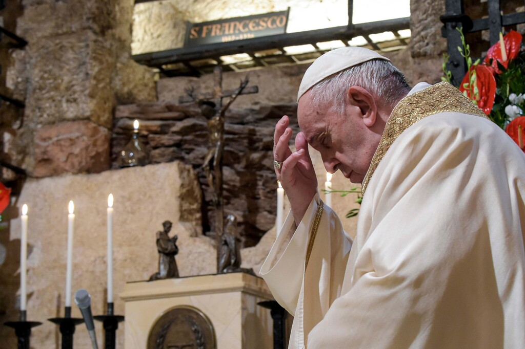 (Vatican Media via AP)  Pope Francis celebrates Mass in the crypt of the Basilica of St. Francis, in Assisi, Italy, Saturday, Oct. 3, 2020. Pope Francis travelled to the homeland of his nature-loving namesake on Saturday to sign an encyclical laying out his vision of a post-COVID world built on solidarity, fraternity and care for the environment.