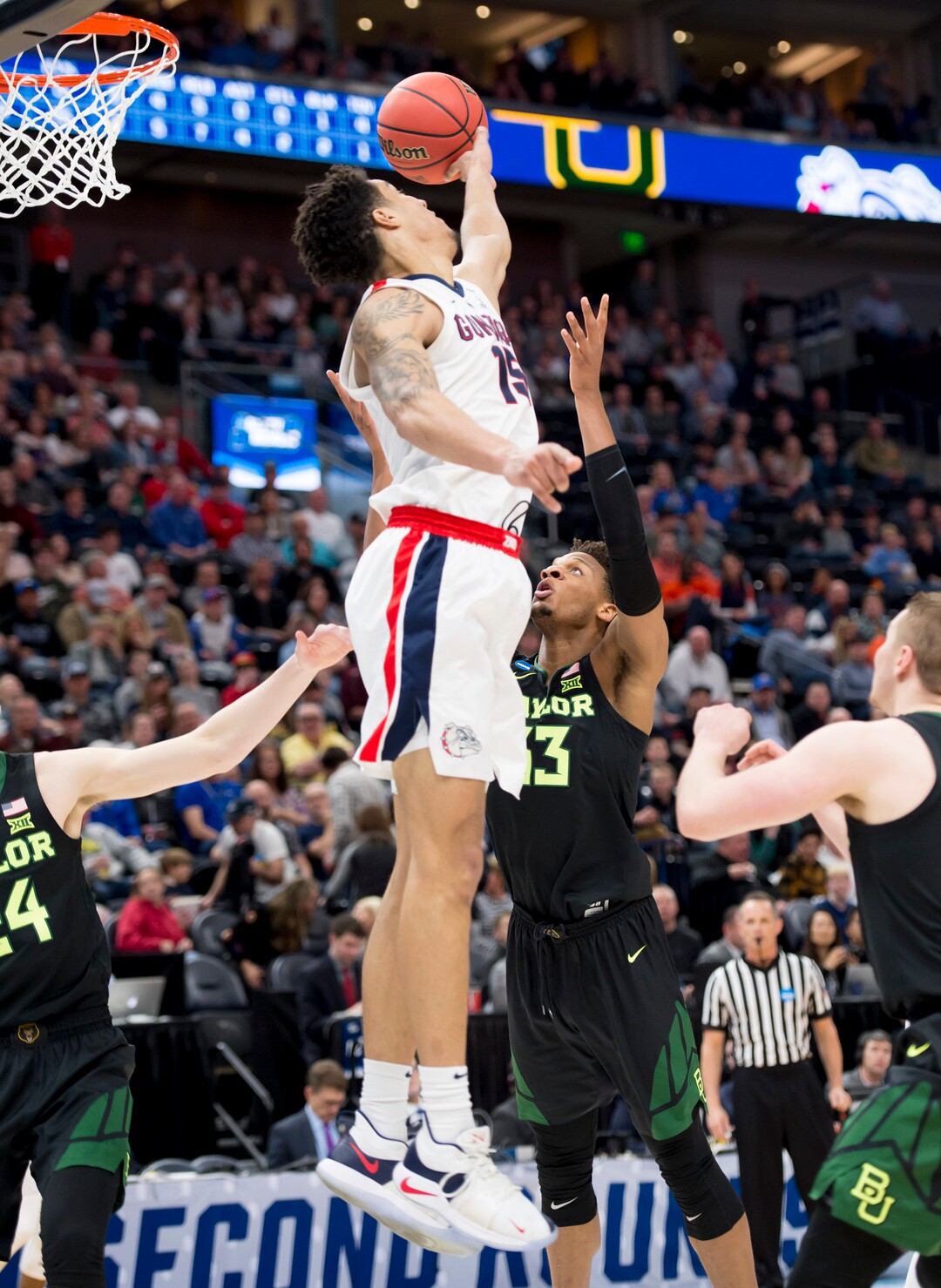 (Leah Hogsten  | The Salt Lake Tribune)  Gonzaga Bulldogs forward Brandon Clarke (15) blocks a shot by Baylor Bears guard King McClure (3) as Baylor faces Gonzaga in the second round of the NCAA tournament in Salt Lake City on Saturday, March 23, 2019.