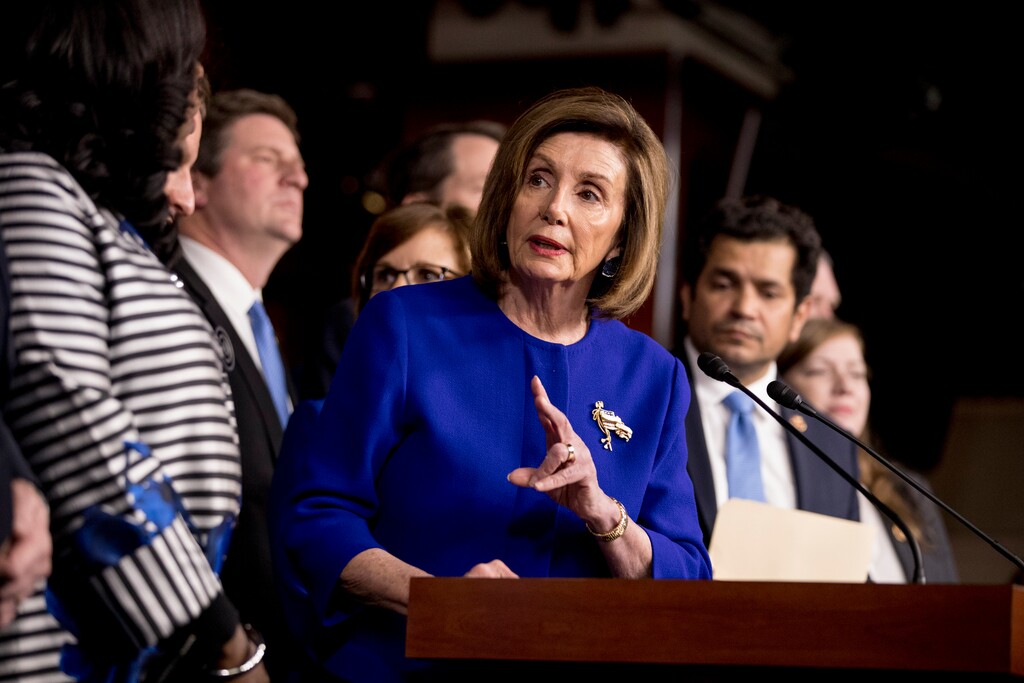 (Andrew Harnik | AP) House Speaker Nancy Pelosi of Calif., accompanied by House Congress members speaks at a news conference to discuss the United States Mexico Canada Agreement (USMCA) trade agreement, Tuesday, Dec. 10, 2019, on Capitol Hill in Washington.