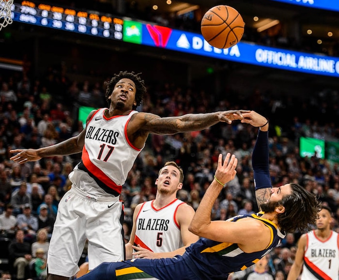 (Trent Nelson | The Salt Lake Tribune)  Portland Trail Blazers forward Ed Davis (17) knocks the ball away from Utah Jazz guard Ricky Rubio (3) as the Utah Jazz host the Portland Trail Blazers, NBA basketball in Salt Lake City, Wednesday November 1, 2017.
