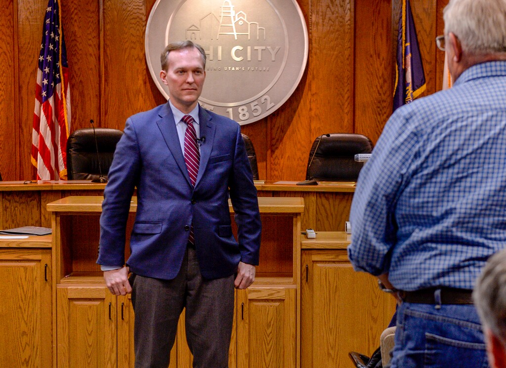 (Leah Hogsten | Tribune file photo) Congressman Ben McAdams is questioned by John Hansen about border security and his stance on abortion Tuesday evening. McAdams met with his constituents in Utah County during his second town hall at Lehi City Council chambers, Feb. 19, 2019.