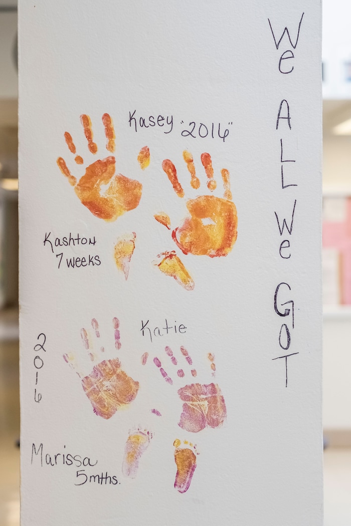 The handprints of incarcerated mothers and their child's footprints adorn the walls at Decatur Correctional Center in Decatur, Ill., on April 9, 2018. (Whitney Curtis | The Washington Post)