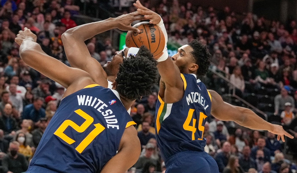 (Leah Hogsten | The Salt Lake Tribune) Utah Jazz guard Donovan Mitchell (45) blocks Orlando Magic center Wendell Carter Jr. (34) as the Utah Jazz host the Orlando Magic at Vivint Arena in Salt Lake City, Feb. 10, 2022. 