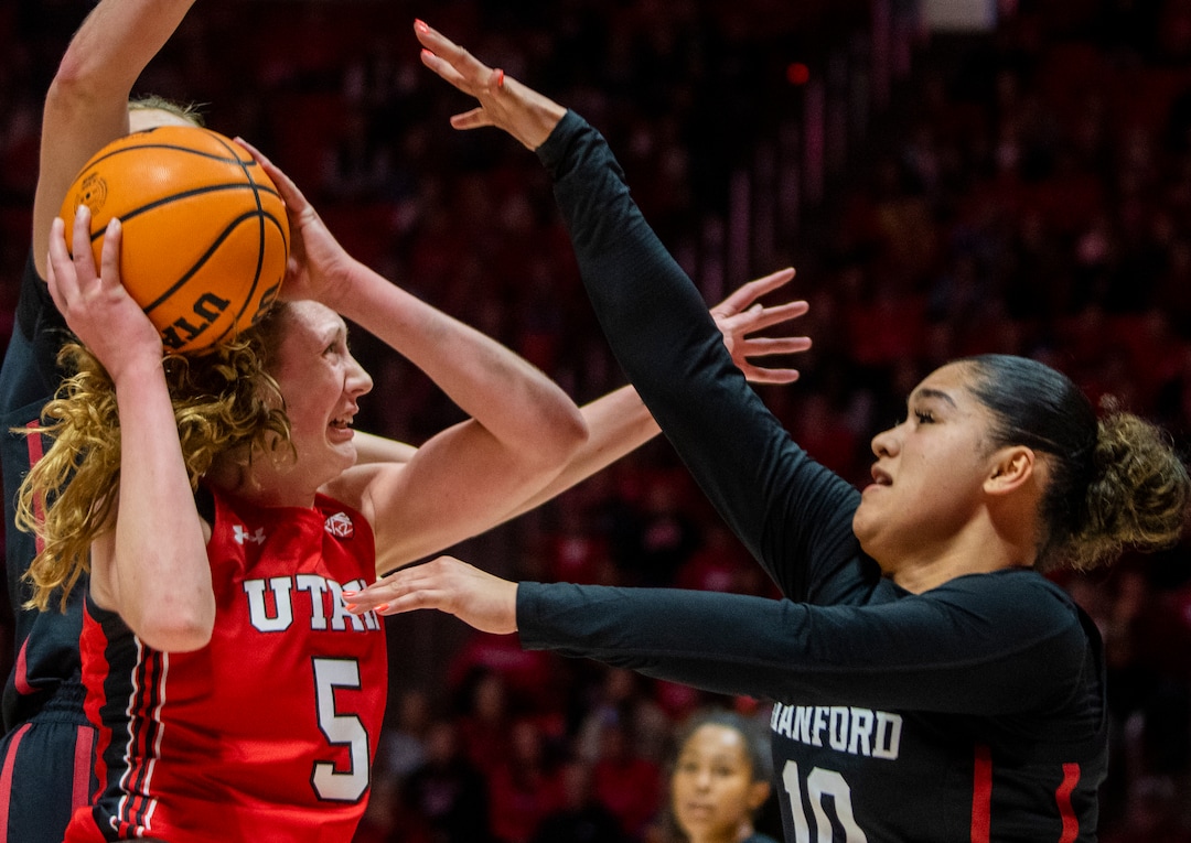 (Rick Egan | The Salt Lake Tribune) Utah Utes guard Gianna Kneepkens (5) takes the ball inside, as Stanford Cardinal guard Talana Lepolo (10) defends, in PAC-12 action between the Utah Utes and the Stanford Cardinals, at the Jon M. Huntsman Center, on Saturday, Feb. 25, 2023.
