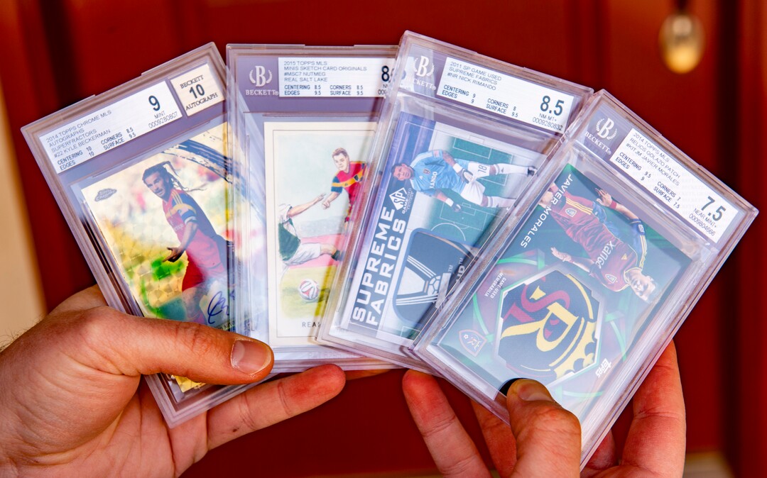 (Rick Egan  |  The Salt Lake Tribune)   Robert Kreib holds some of the RSL cards he trades with people around the country, Tuesday April 7, 2020