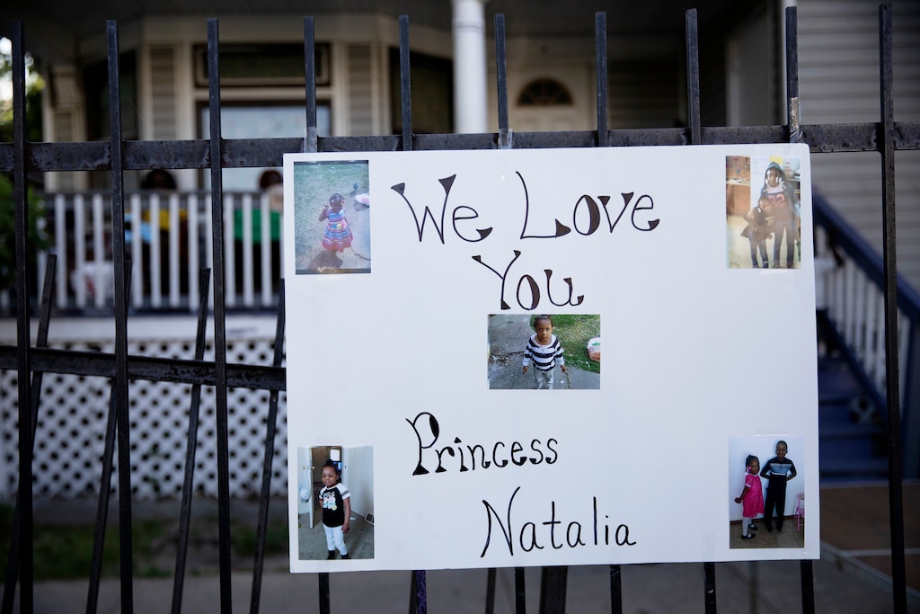 (Erin Hooley | Chicago Tribune via AP)

In this July 5 photo, a poster with photos are attached to a fence in the South Austin neighborhood of Chicago during a vigil for 7-year-old Natalie Wallace, who was shot and killed as her family gathered to celebrate the Fourth of July holiday.