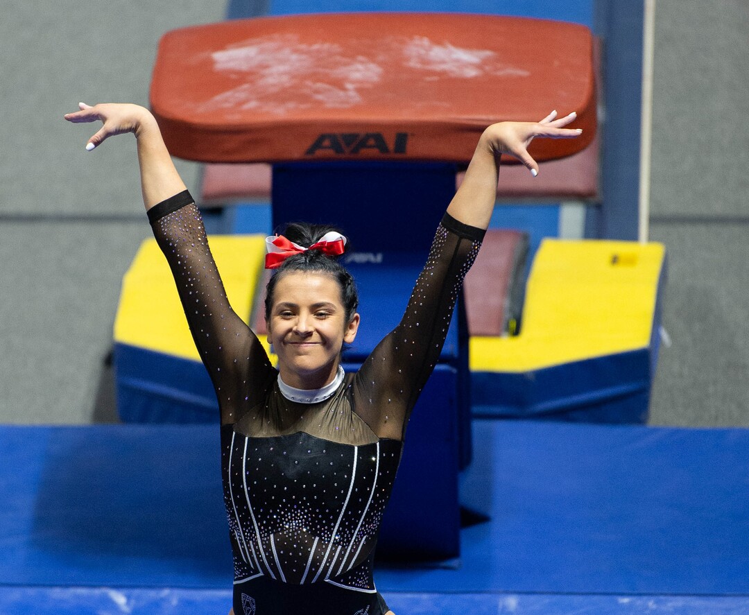 (Francisco Kjolseth  | The Salt Lake Tribune) Alexia Burch celebrates her landing off the vault in PAC-12 gymnastics action Utah vs UCLA, at the Huntsman Center on Friday, Feb. 19, 2021.